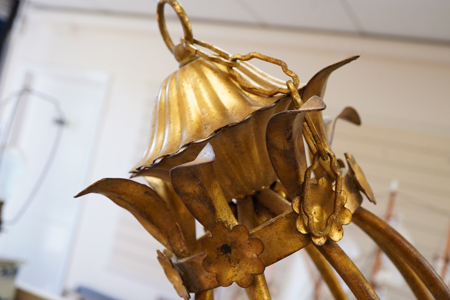 A gilt metal eight light basket chandelier, 86cm
